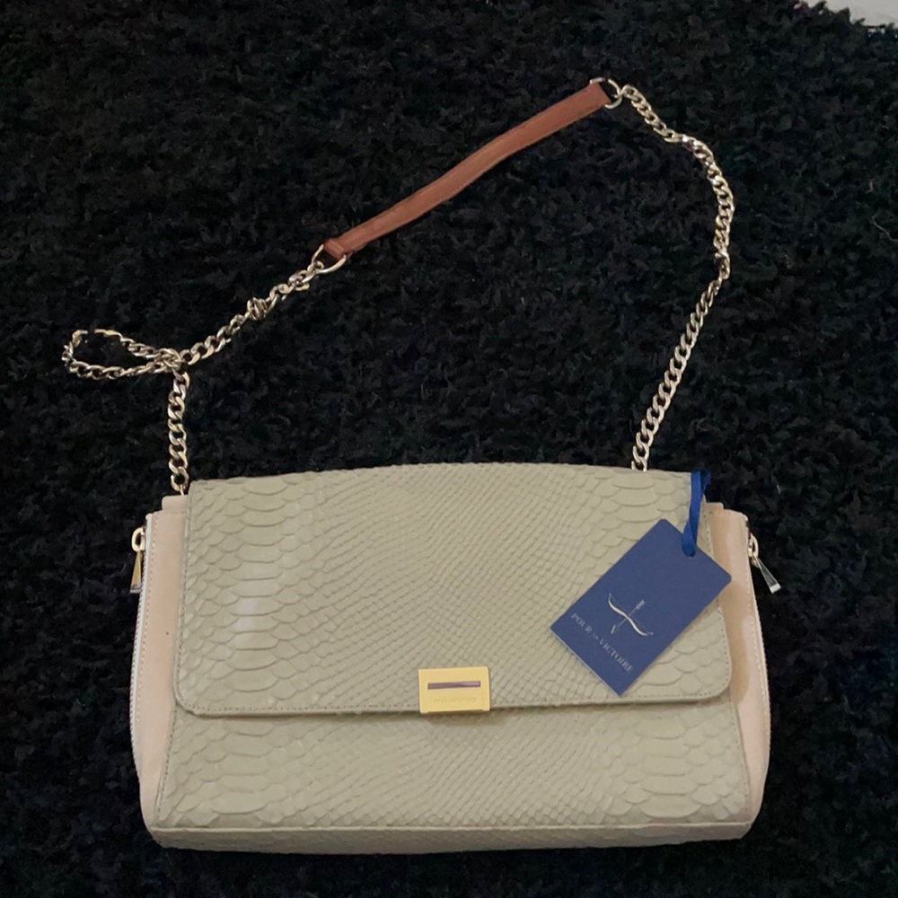 Pour la victoire bag with tag